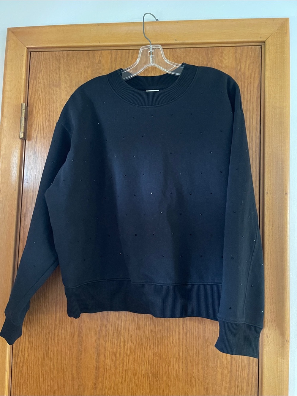 a new day Black Crewneck Sweatshirt with Subtle Embellishments